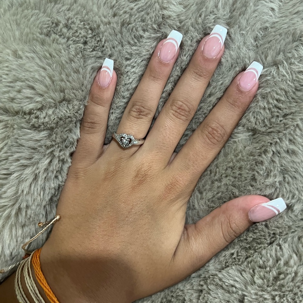 brand new worn once size 5 women’s promise ring.